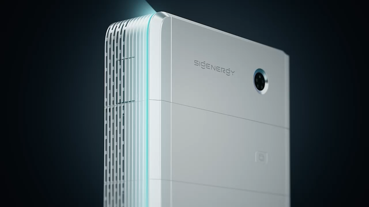 The SigenStor — a white stackable home battery with green ambient lighting and the Sigenergy eagle-eye interface on the front